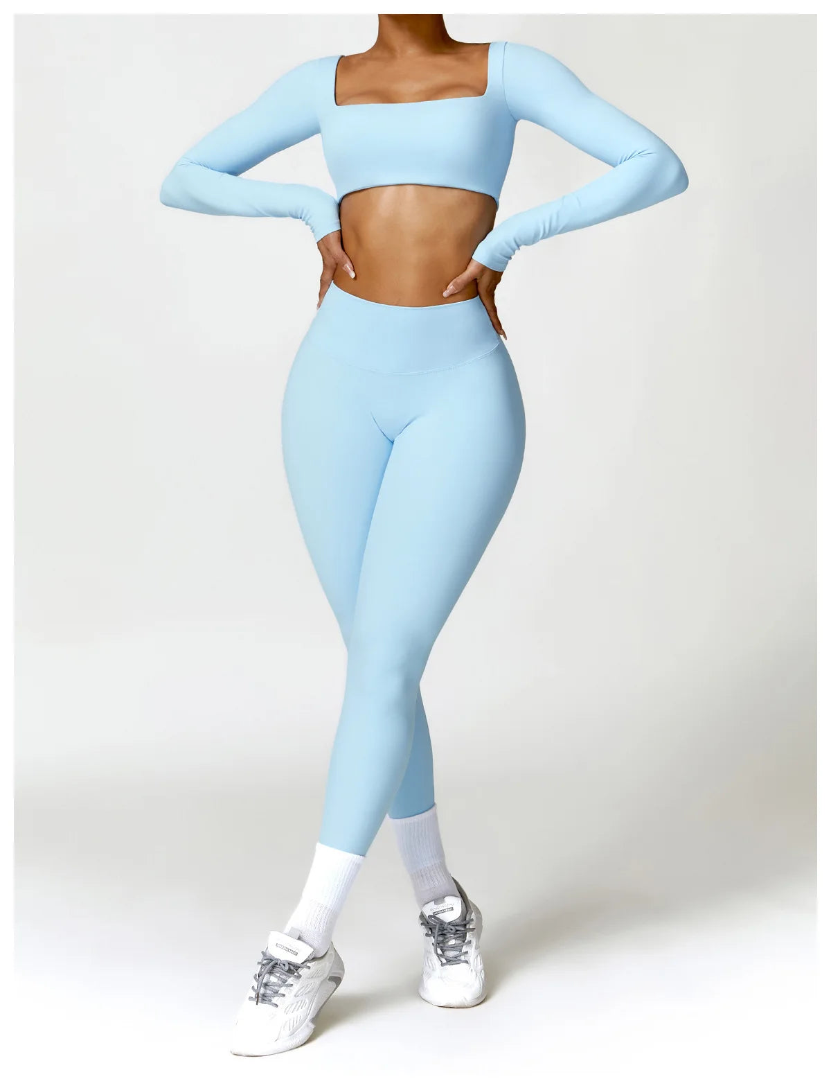 Conjunto Fitness Femenino con Manga Larga y Leggings de Cintura Alta
