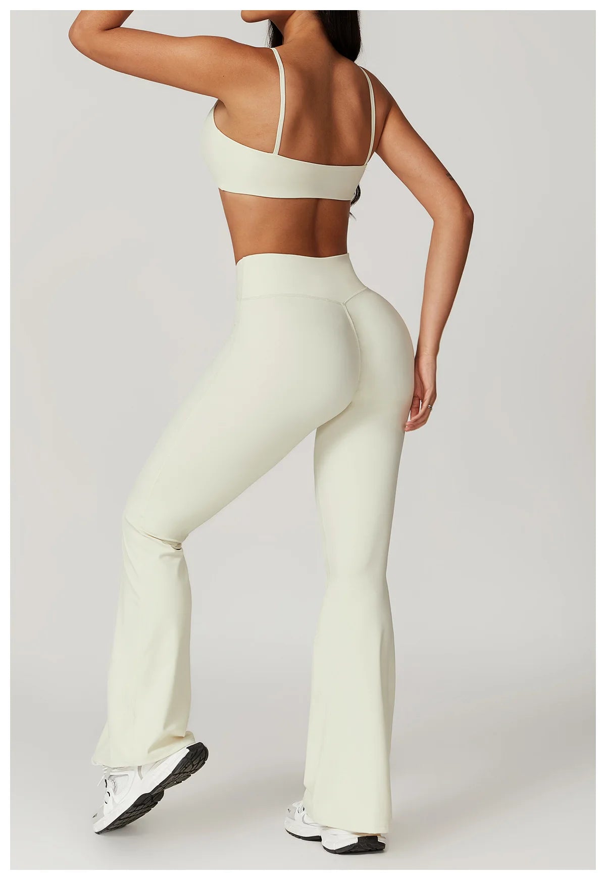 Conjunto Fitness Mujer – Top + Pantalón Acampanado de Cintura Alta