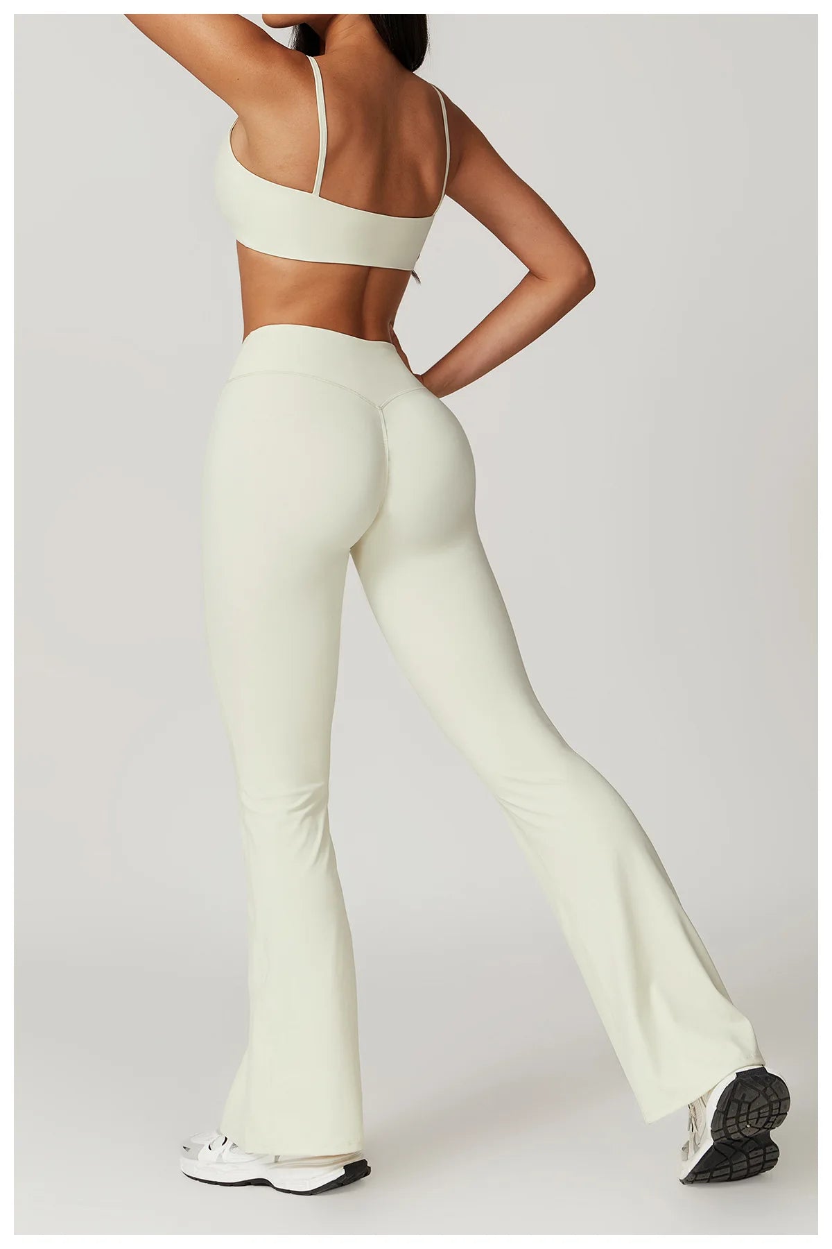 Conjunto Fitness Mujer – Top + Pantalón Acampanado de Cintura Alta